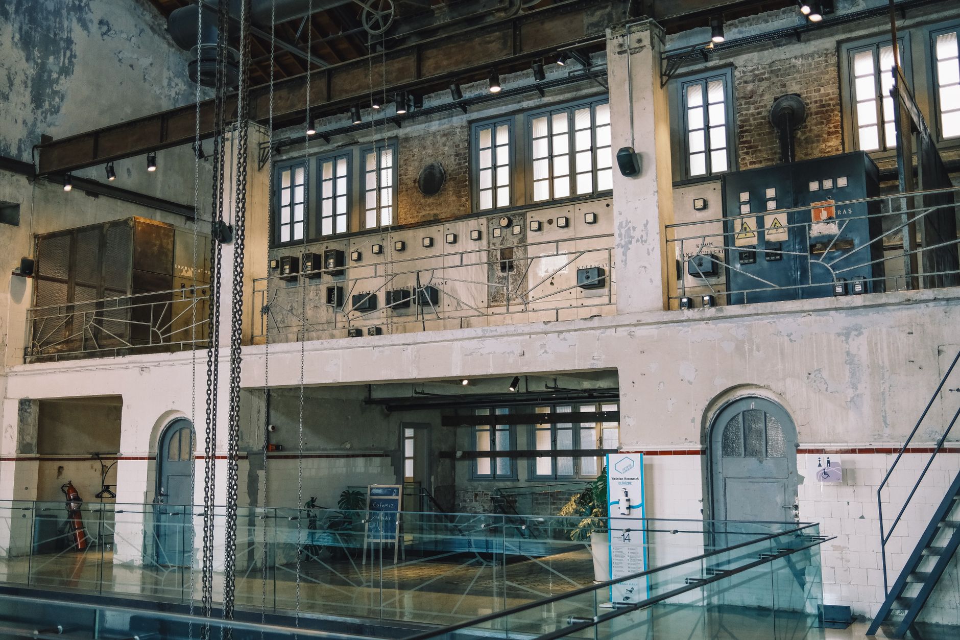 Explore this vintage industrial factory interior with exposed bricks and machinery, ideal for design concepts.